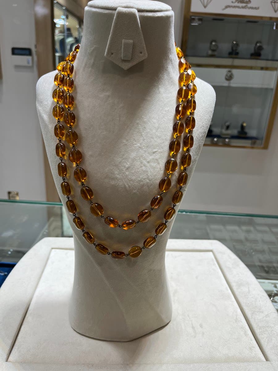 Collier en Ambre à Trois Rangées