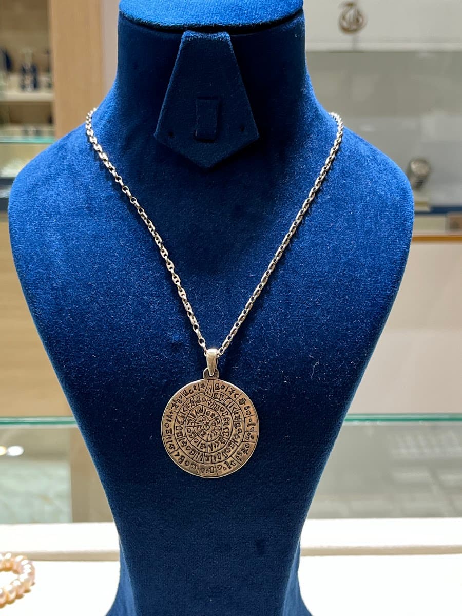 Collier avec pendentif disque de Phaistos