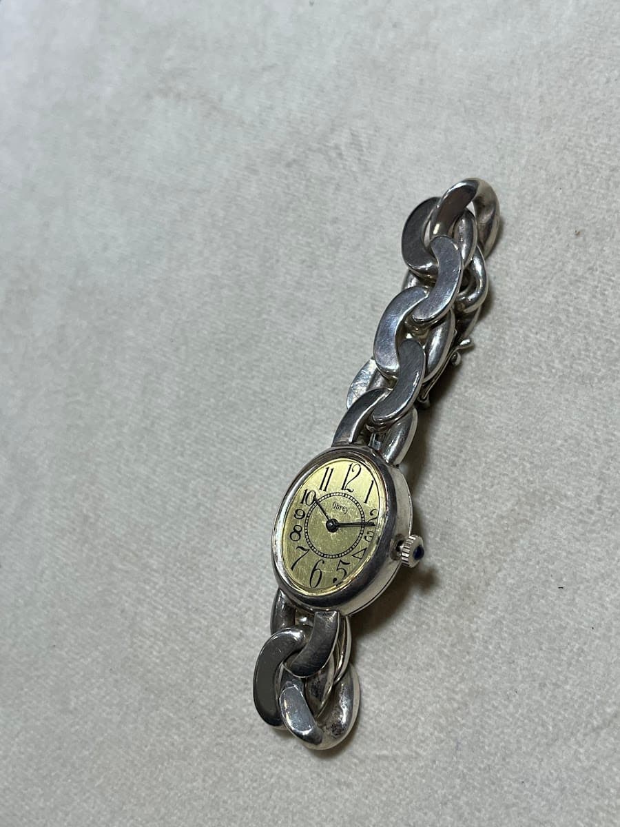 Montre Obey en argent avec bracelet à maillons