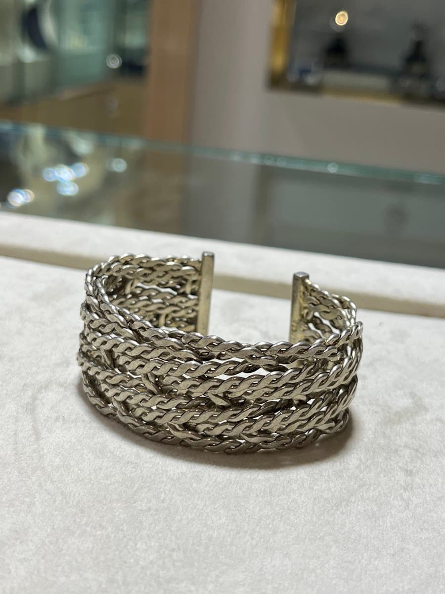 Bracelet manchette à chaînes torsadées argentées