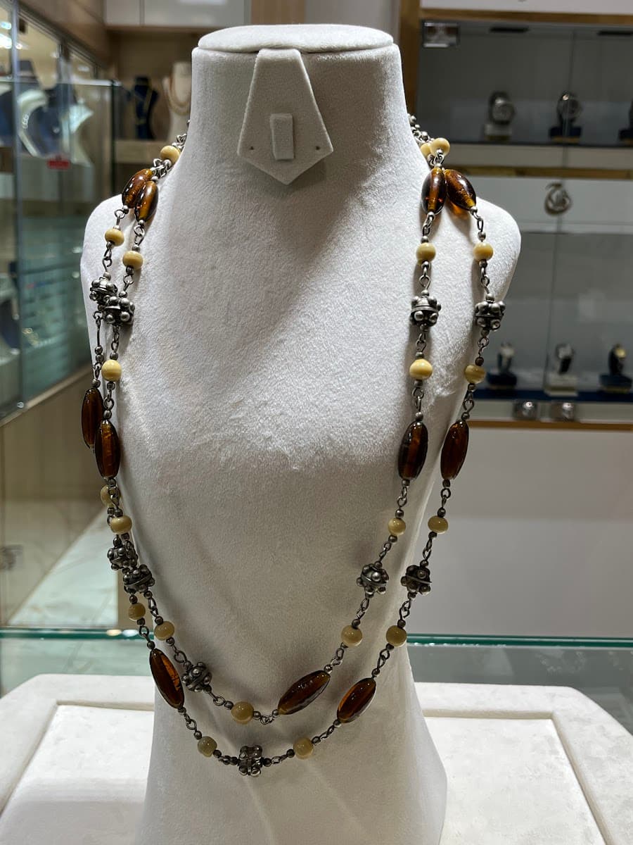 Collier à perles en ambre et argent